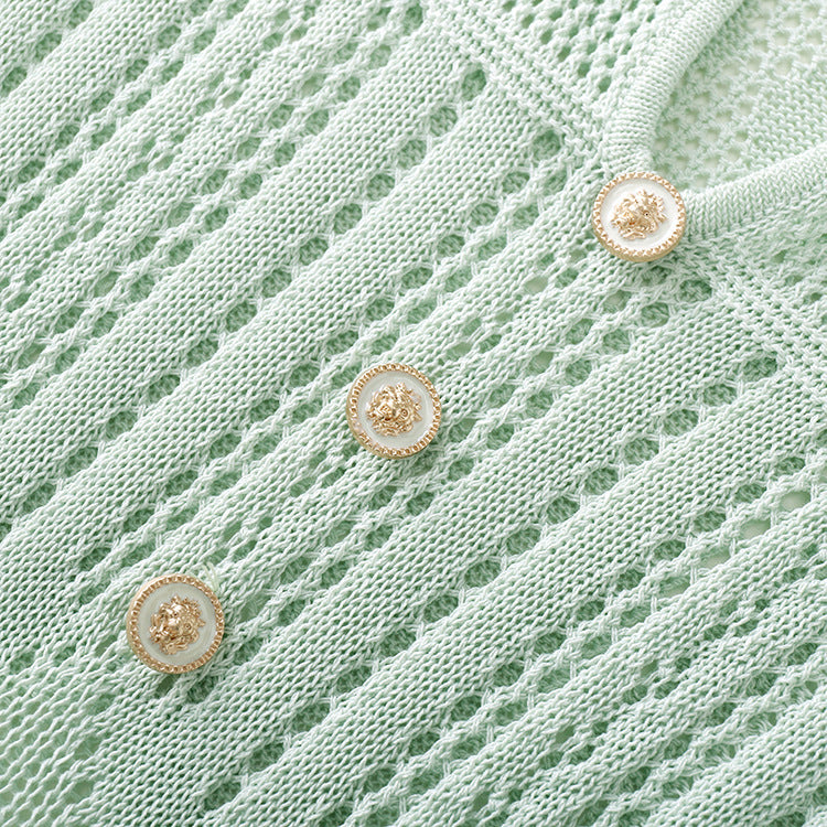 Elegant dress with round neckline, short sleeves, drawstrings, ribbing, and slim fit, made from high-quality long knit fabric