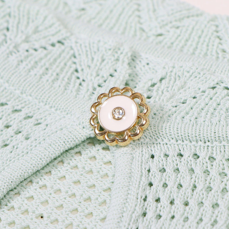 Elegant knit dress with round neckline, short sleeves and drawstrings, mid-length, high quality