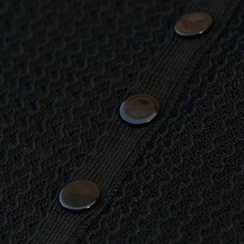 Elegant black set featuring a V-neck knit top and high-quality long high-waisted skirt