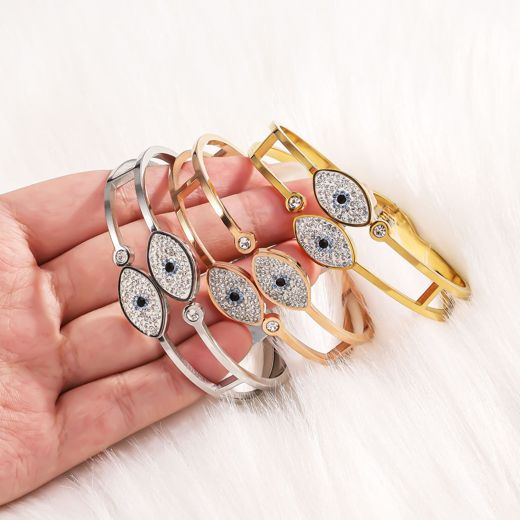 Cross border stainless steel spring bracelet, popular in Europe and America, Devil's Eye bracelet, personalized and high-end, open titanium steel bracelet