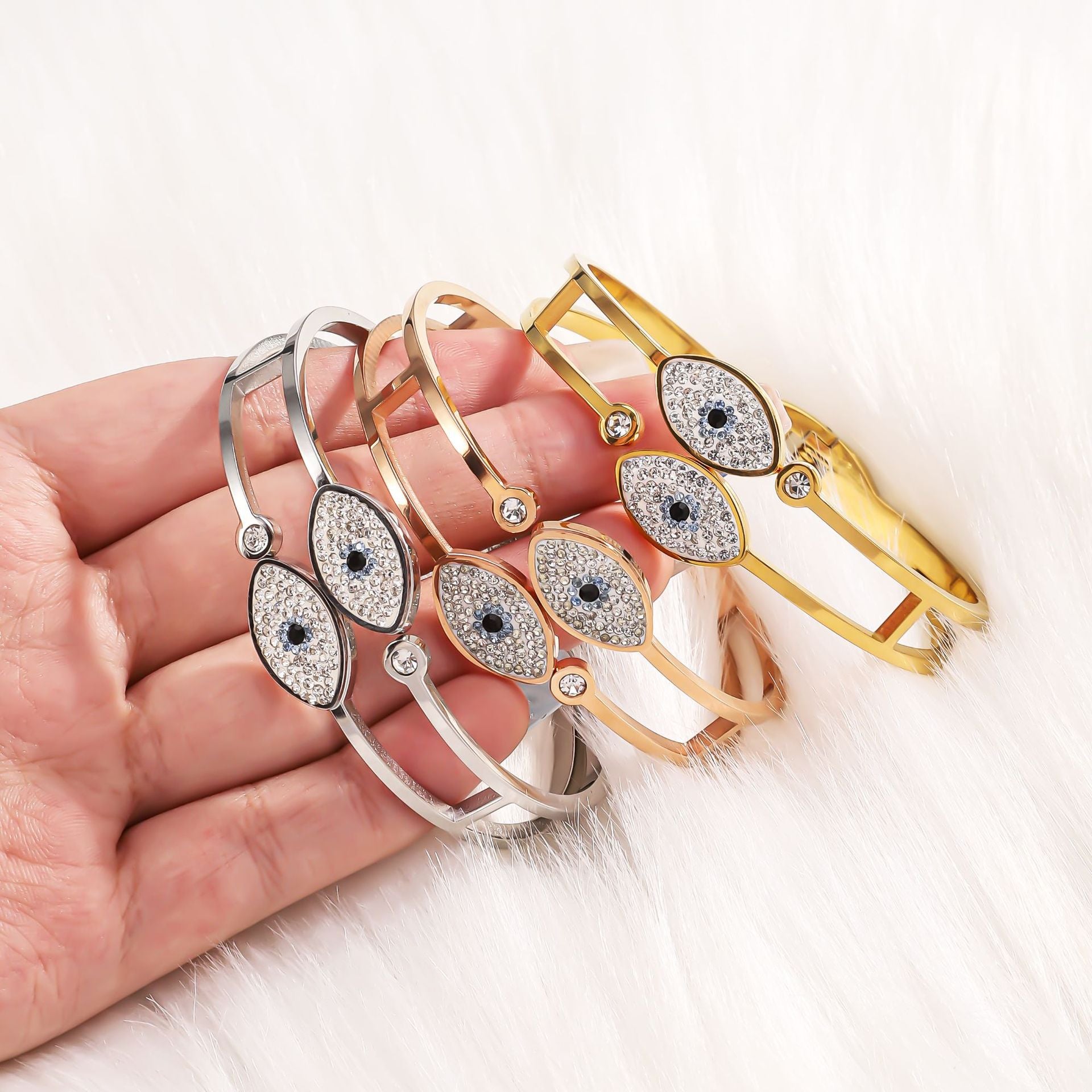 Cross border stainless steel spring bracelet, popular in Europe and America, Devil's Eye bracelet, personalized and high-end, open titanium steel bracelet