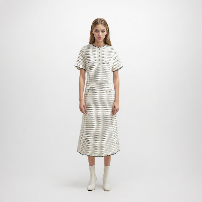 High-quality, elegant knit dress with a round neckline, short sleeves, lace details, and mid-length hem
