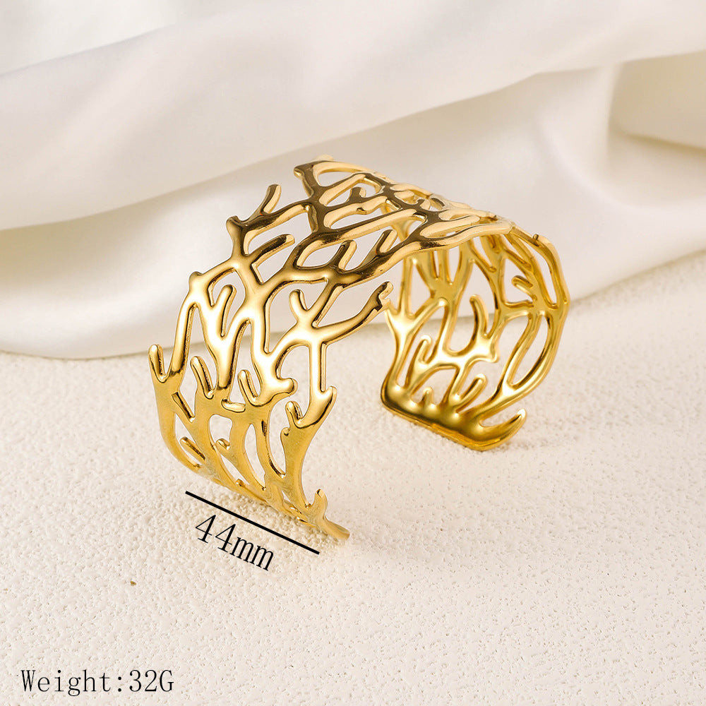 Stainless steel open hydraulic bracelet, European and American women's fashionable arm ring plated with 18K real gold, cross-border hot selling titanium steel bracelet