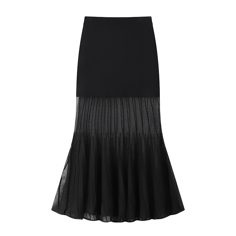 Stylish and modern casual set with a sleeveless, round-neck top and a knitted skirt with drawstrings