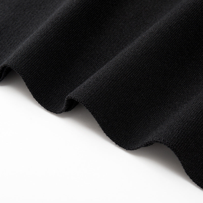 Elegant and sophisticated black knit dress, V-neck, sleeveless, fitted, with lacing and slit, medium length, high quality