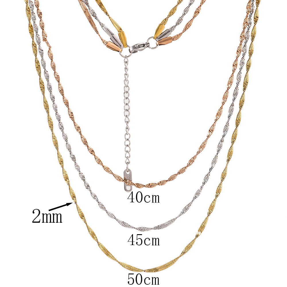 Stainless steel three-layer twisted push dense layered necklace for women, versatile plated 18K real gold lock bone chain ins titanium steel snake bone chain