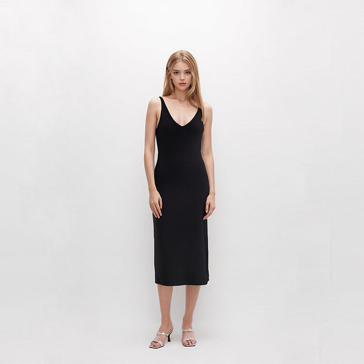 Elegant and sophisticated black knit dress, V-neck, sleeveless, fitted, with lacing and slit, medium length, high quality