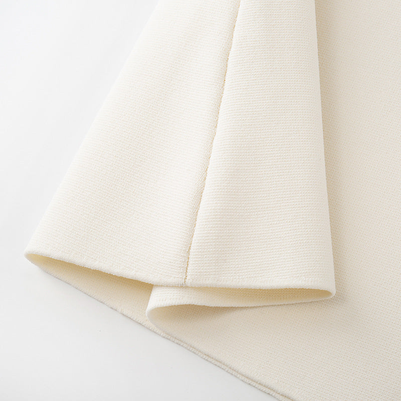 Fitted knit dress with French elegance, sleeveless, with round neckline and simple buttons, high quality