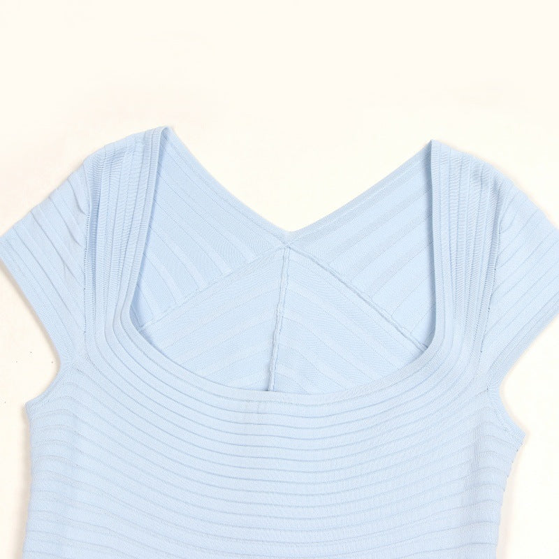 Elegant knit dress with square neckline, short sleeves, A-line cut, and mid-length, high quality