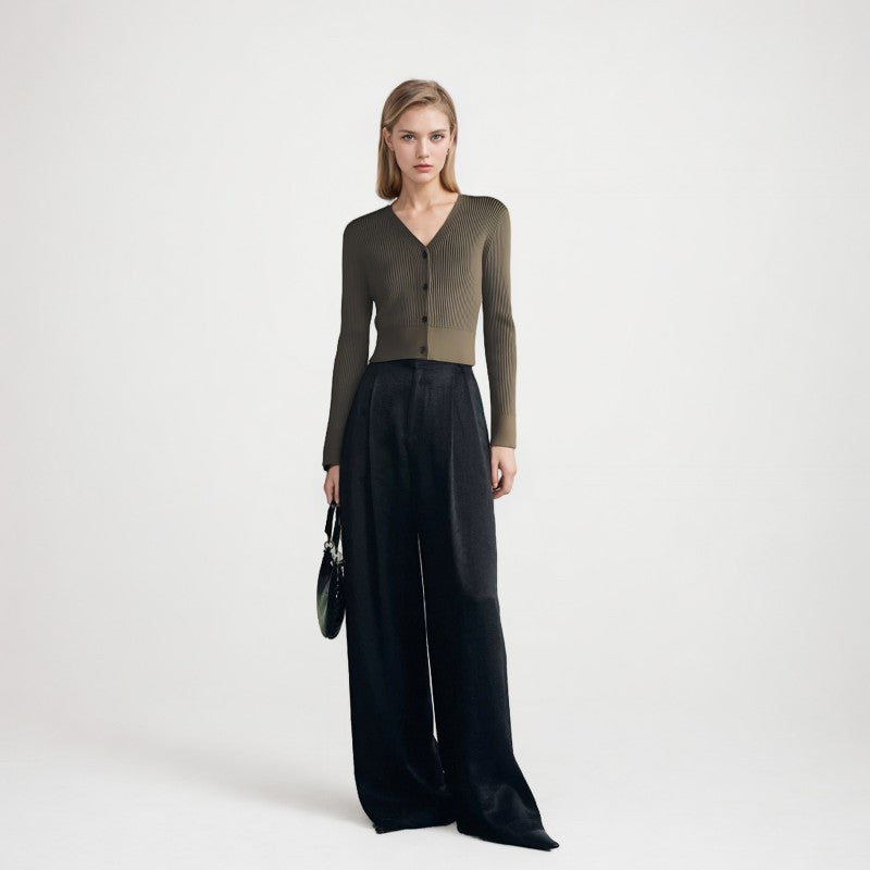 Elegant burgundy sweater with V-neck, long sleeves, and simple high-quality buttons