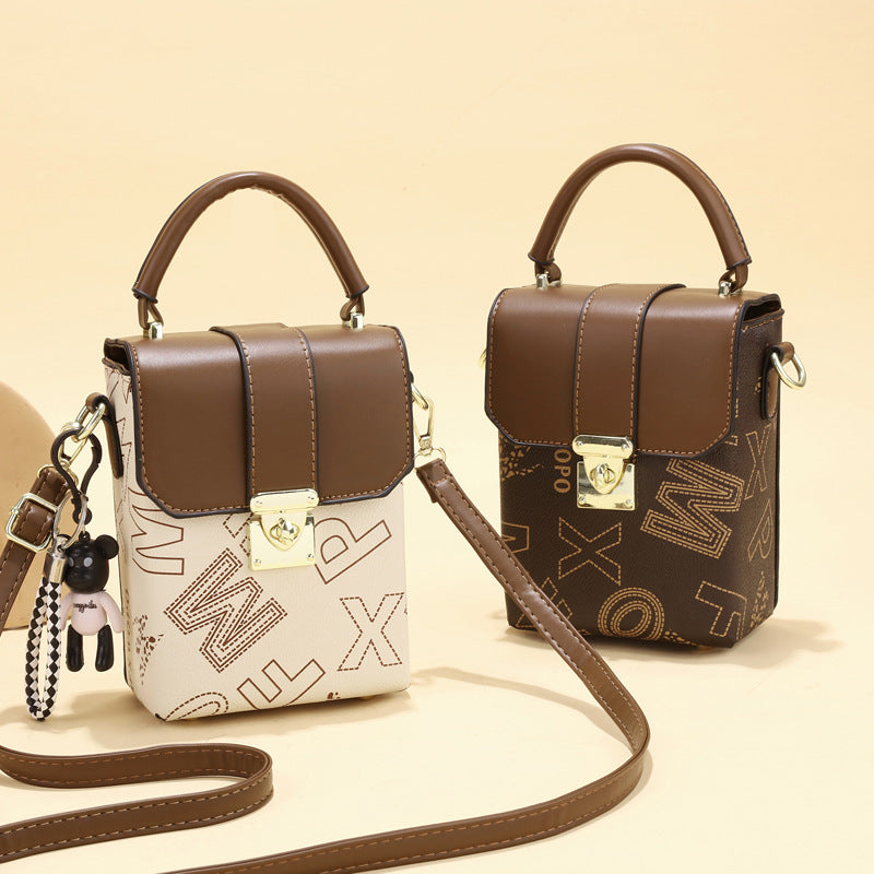 2025 new retro niche mini women's bag with simple letter printing, single shoulder handheld large capacity change phone bag