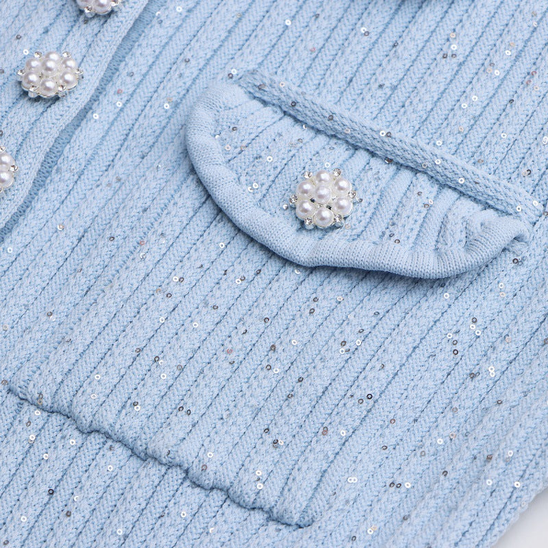 Elegant light blue dress with polo collar and short sleeves in high-quality ribbed knit fabric