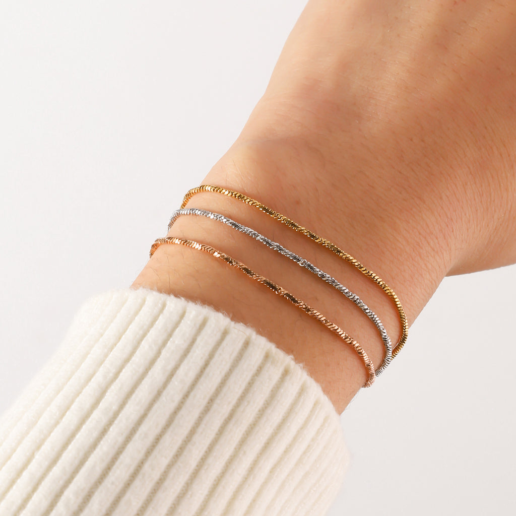 Stainless steel twisted square snake bracelet for women's European and American fashion trends, 18K vacuum electroplated titanium steel snake bone chain bracelet inside the furnace