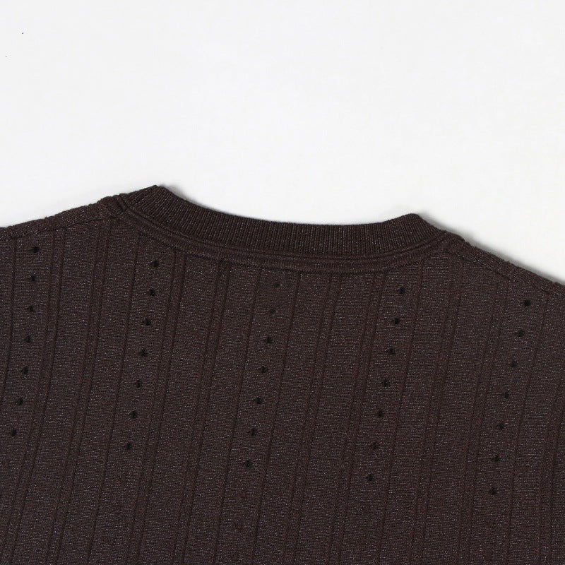 Elegant midi dress in knit fabric with a round neckline and long sleeves, embroidered with high-quality gold and silver thread