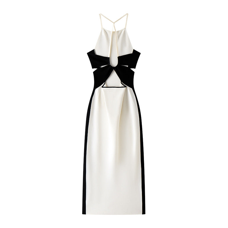High-quality, elegant strapless, sleeveless knit dress with contrasting black and white patchwork, slimming slit, and mid-length.