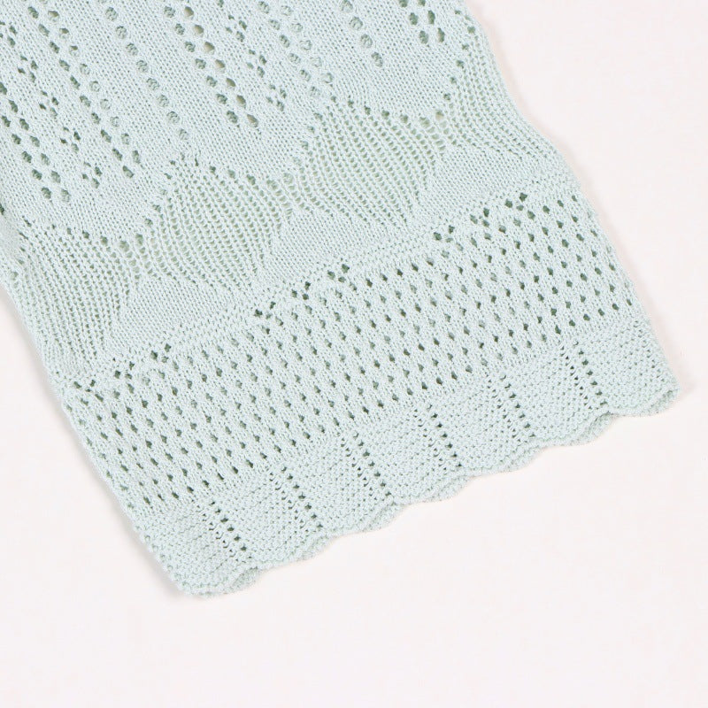 Elegant knit dress with round neckline, short sleeves and drawstrings, mid-length, high quality