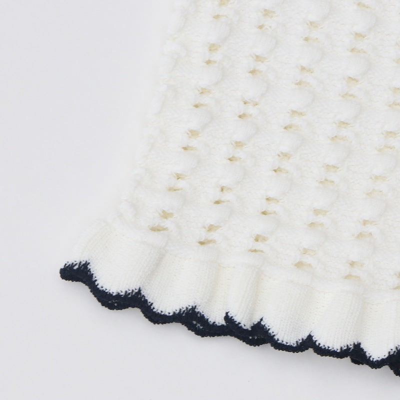 High-quality, elegant knit dress with a round neckline, short sleeves, lace details, and mid-length hem