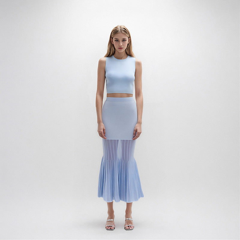 Stylish and modern casual set with a sleeveless, round-neck top and a knitted skirt with drawstrings
