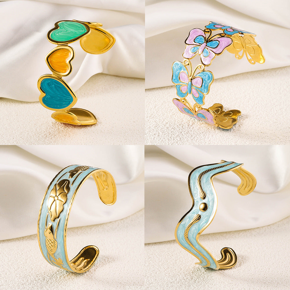 Cross border new stainless steel oil pressure painted open bracelet, exaggerated European and American women's plated 18K gold adjustable bracelet