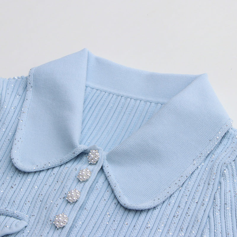 Elegant light blue dress with polo collar and short sleeves in high-quality ribbed knit fabric