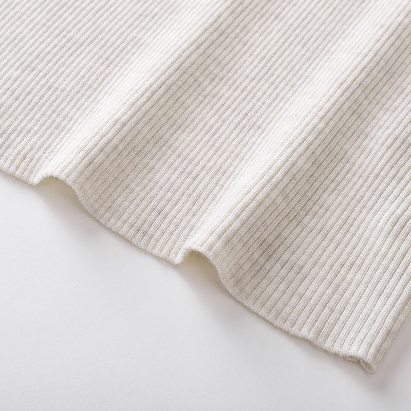 Elegant and sophisticated wool blouse with bare shoulders and high-quality feather knit