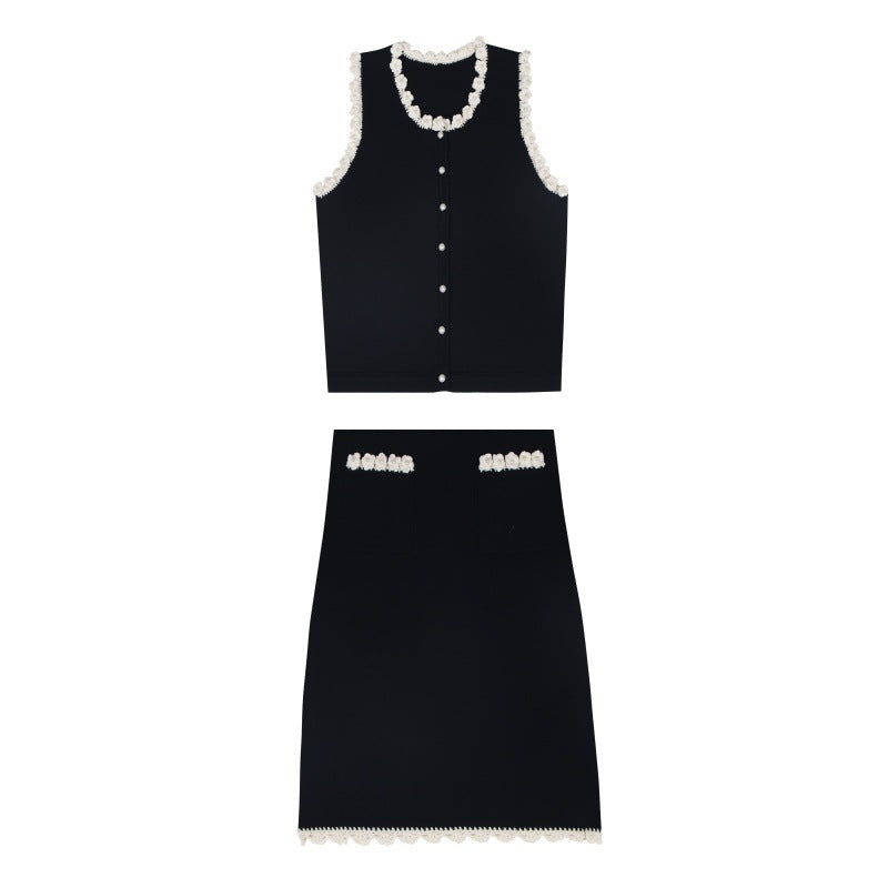 Sophisticated and elegant set featuring a black lace-knit vest with a high-quality, high-waisted, short A-line skirt