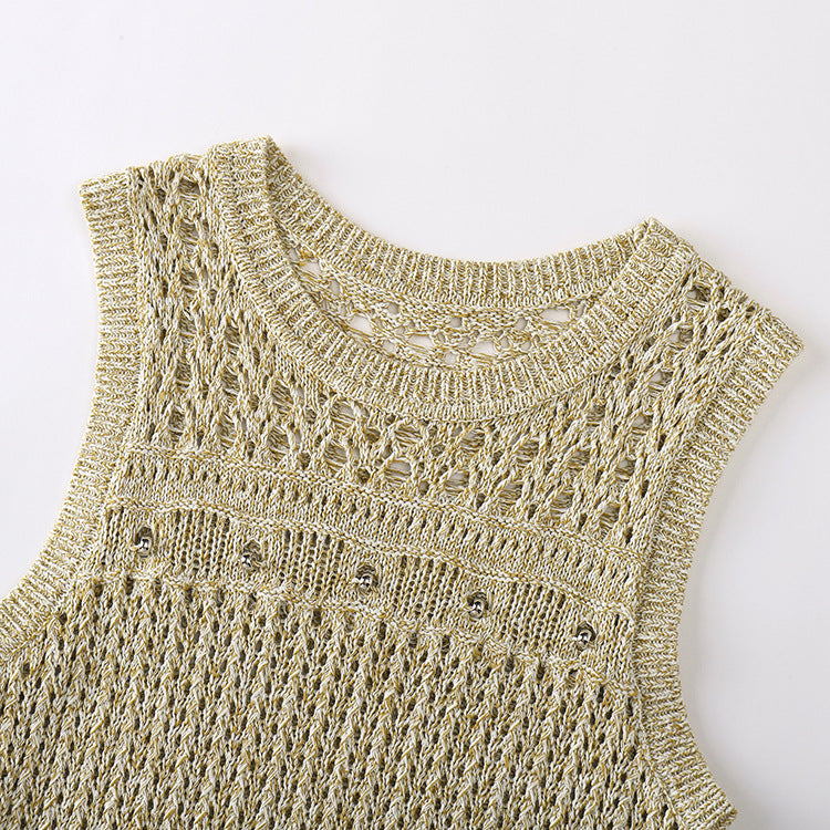 Knitted dress with round neckline and open fringe details, sleeveless miniskirt