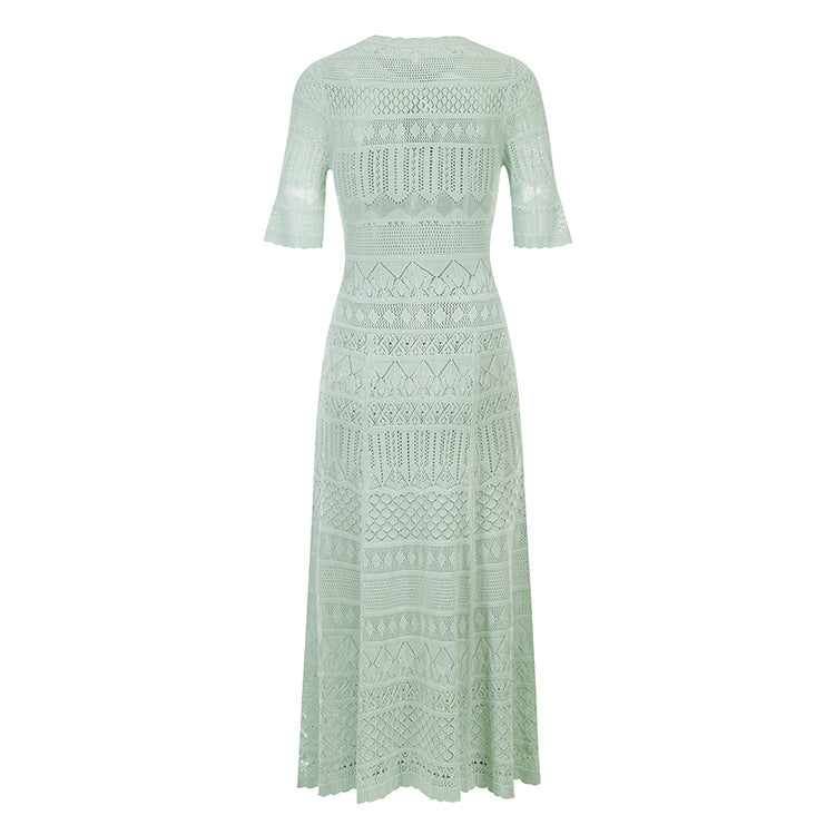 Elegant dress with round neckline, short sleeves, drawstrings, ribbing, and slim fit, made from high-quality long knit fabric