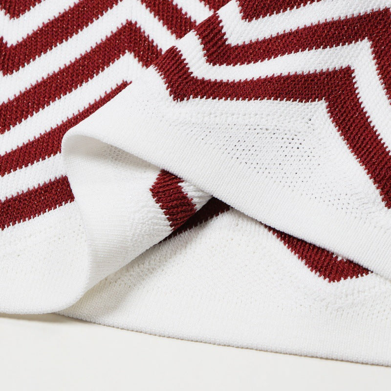 Elegant, high-quality Italian fashion dress with a round neckline, long sleeves, A-line cut, and wavy stripes, made from knitted fabric