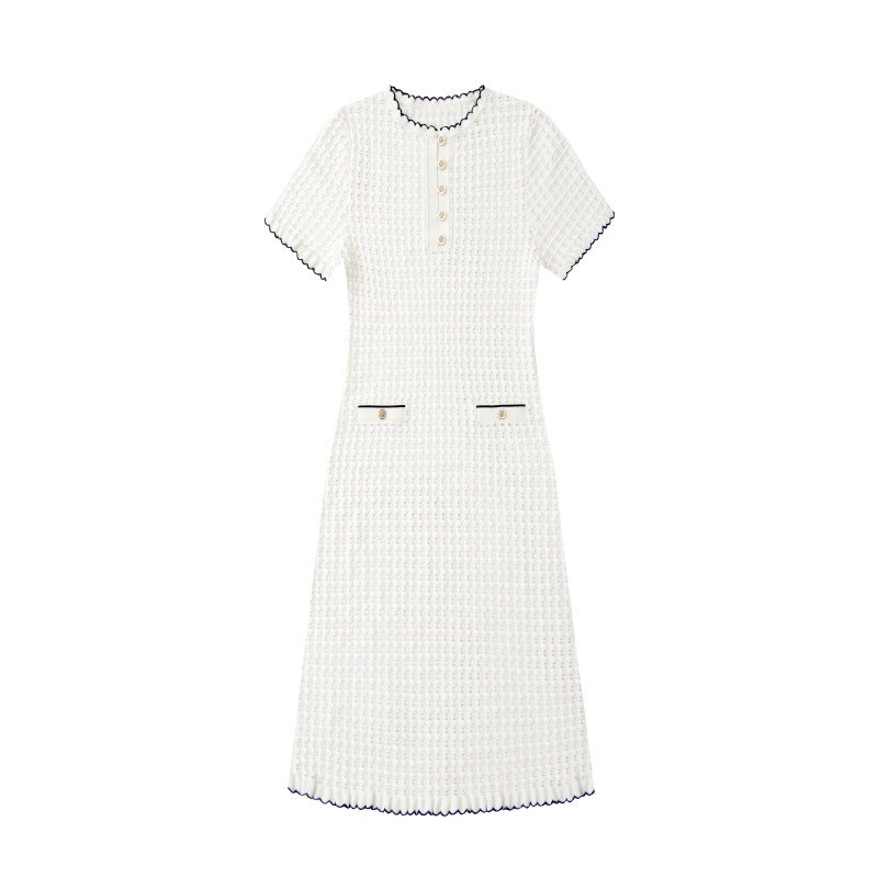 High-quality, elegant knit dress with a round neckline, short sleeves, lace details, and mid-length hem