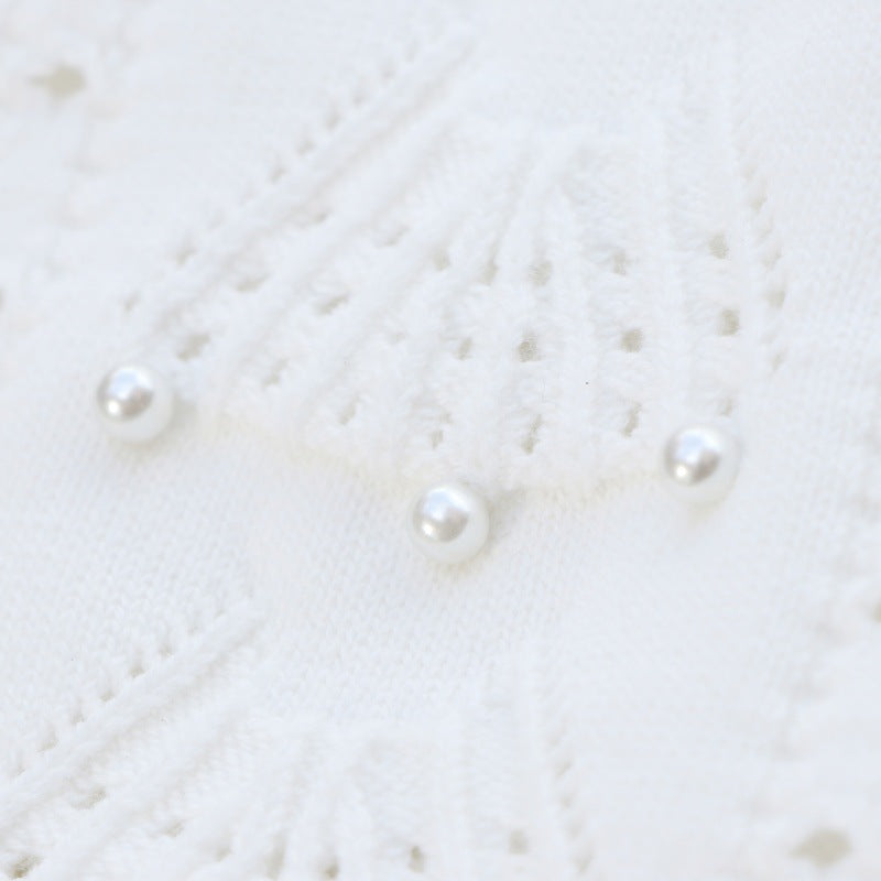 High-quality cotton knit dress with round neckline, sleeveless, with drawstrings and beads, knee length