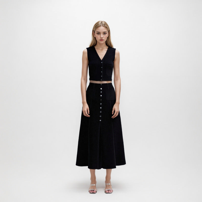 Elegant black set featuring a V-neck knit top and high-quality long high-waisted skirt