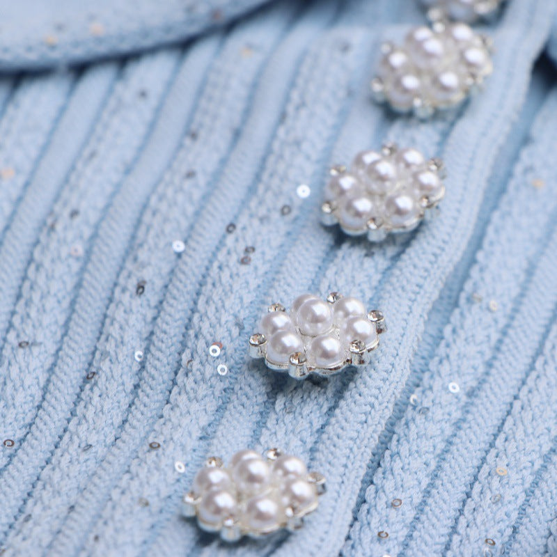 Elegant light blue dress with polo collar and short sleeves in high-quality ribbed knit fabric