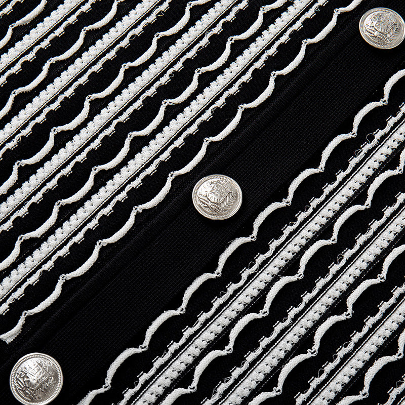 Elegant short-sleeved knit dress with V-neckline, mid-length, and simple buttons