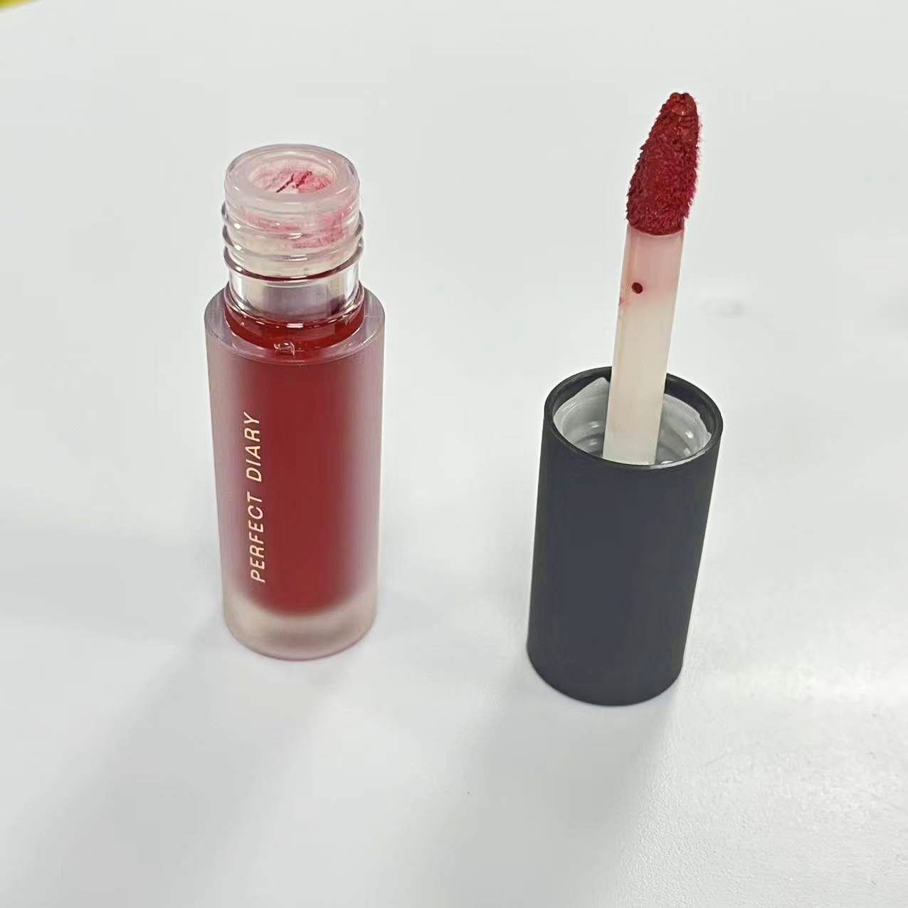 Mini lip gloss in case